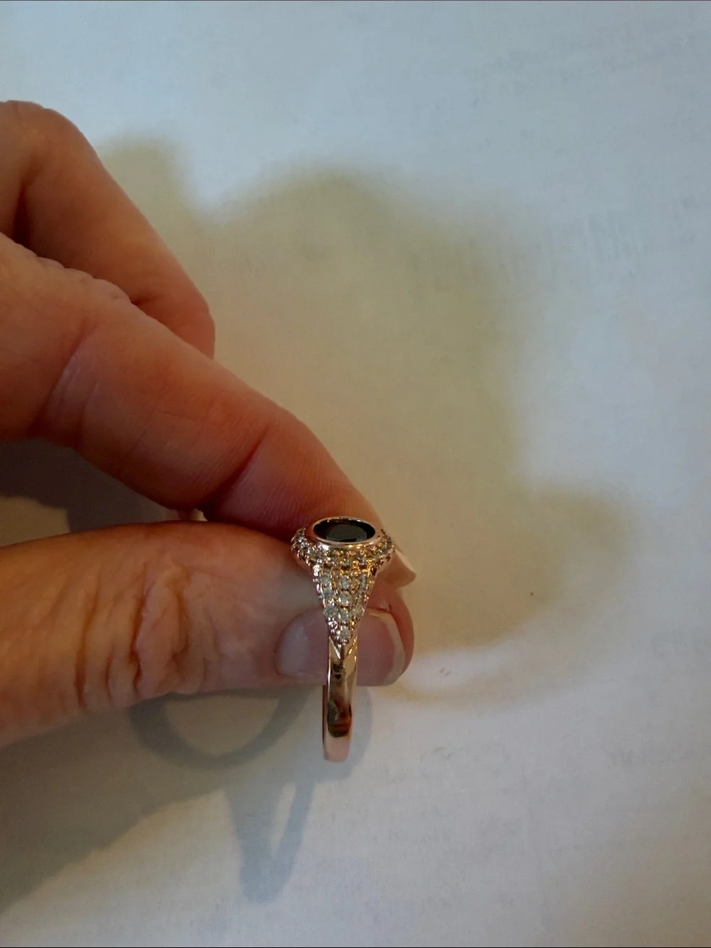 Rose Gold Ring with Black Center Stone and Pavé Accents